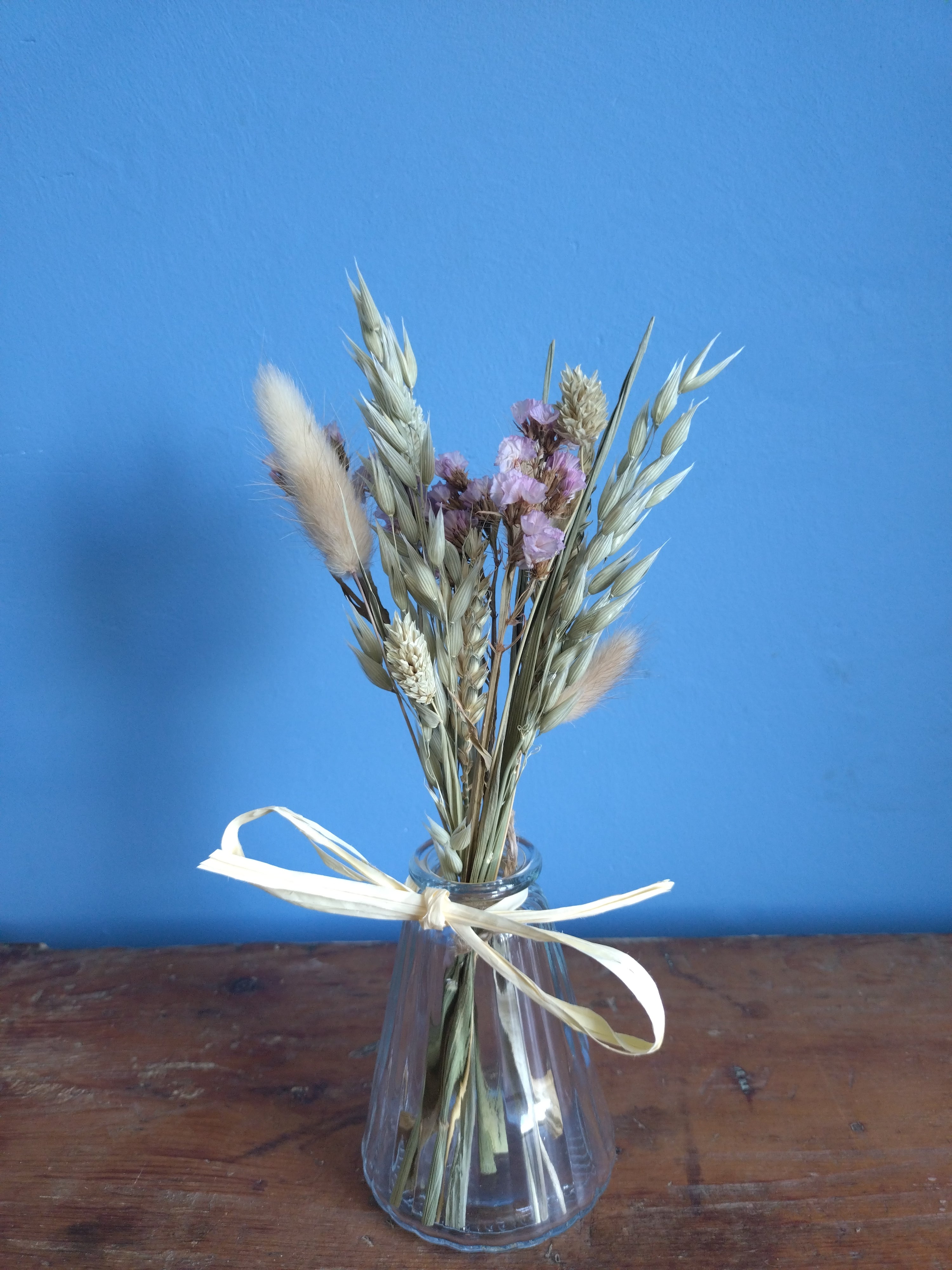 Dried flower posy and vase