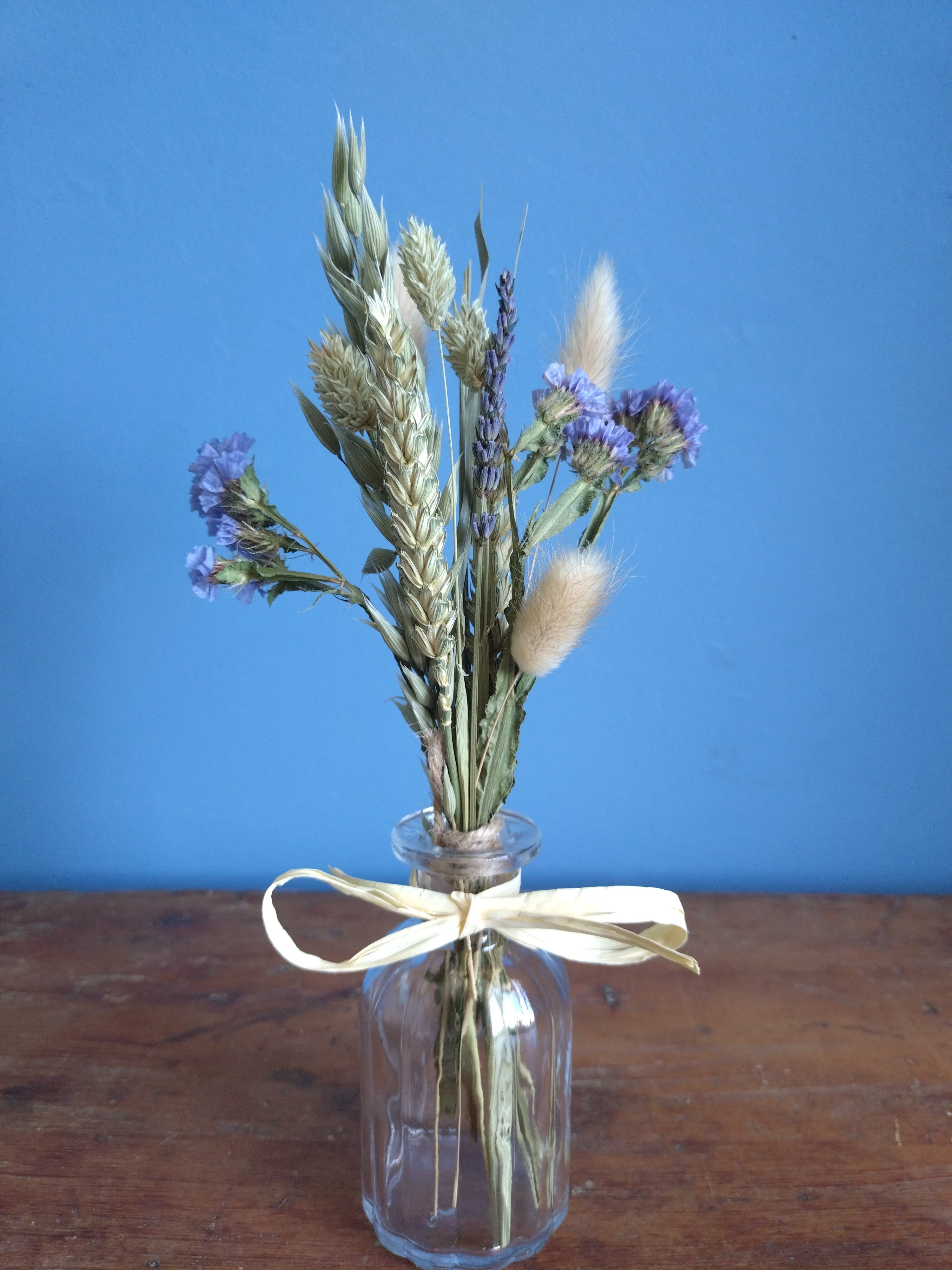 Dried flower posy and vase